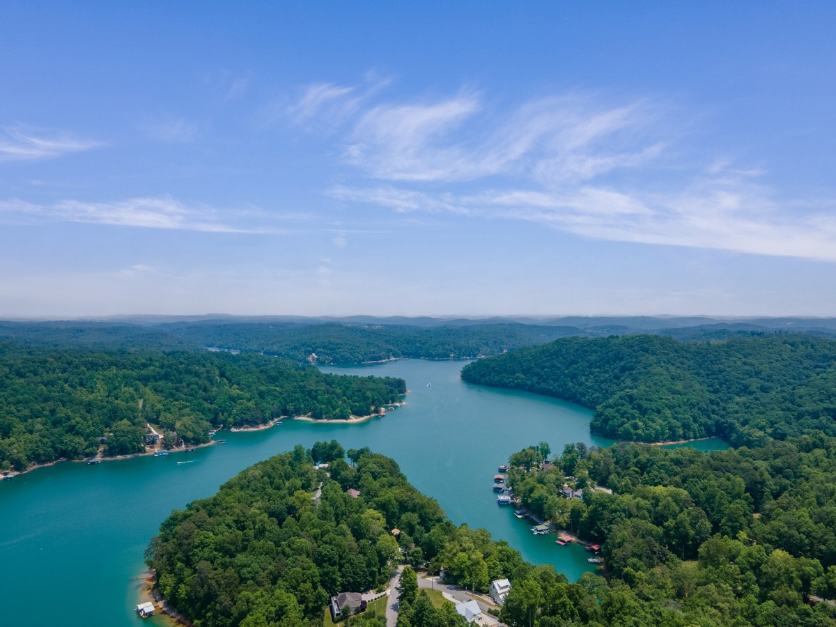 Aerial view of Norris Lake in Tennessee, with blue water and forested peninsulas